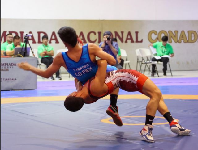 Olimpiada Nacional: Competencias de luchas con gladiadores al estilo grecorromano 